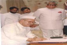 President Dr. Shankar Dayal Sharma signing the Oath register after assuming office of the President