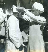 Dr. Rajendra Prasad being conferred with the prestigious Bharat Ratna award by President Dr. Radhakrishnan