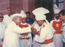 President Dr. Shankar Dayal Sharma receiving Holi Greetings from the staff of Rashtrapati Bhavan